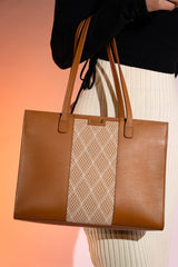 Women's leather tote bag medium size in brown colour with diamond pattern fabric strip and detachable shoulder strap by JULKE. 