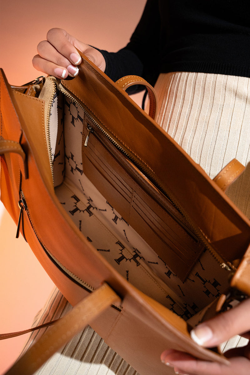 Women's leather tote bag medium size in brown colour with diamond pattern fabric strip and detachable shoulder strap by JULKE. 