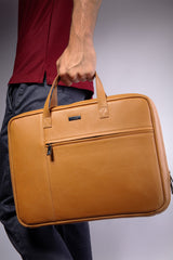 Leather laptop sleeve in light brown colour with top handle by JULKE