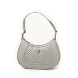 Women's genuine leather shoulder bag in grey with quilted front, gold-tone accents, and adjustable strap by JULKÉ.