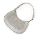 Women's genuine leather shoulder bag in grey with quilted front, gold-tone accents, and adjustable strap by JULKÉ.