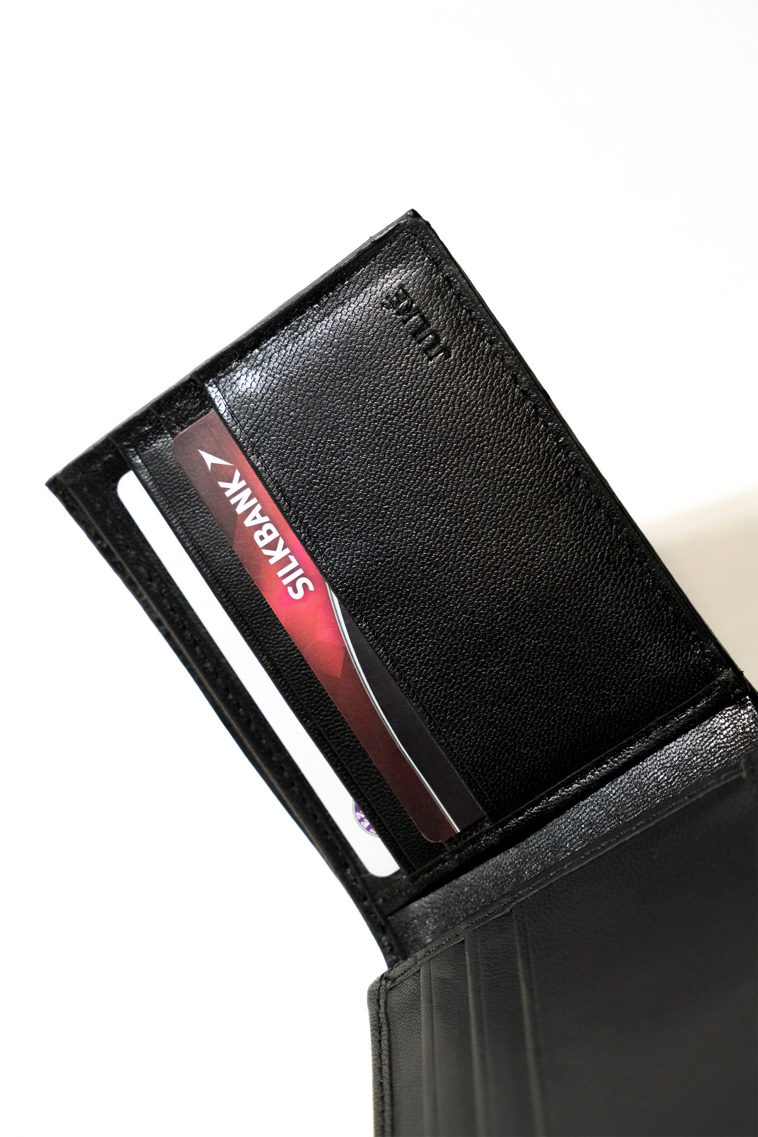 Mens leather wallet in dark brown colour with reptile texture by JULKE