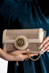 Womens leather shoulder bag and clutch in light gold colour with  flower diamante brooch by JULKE