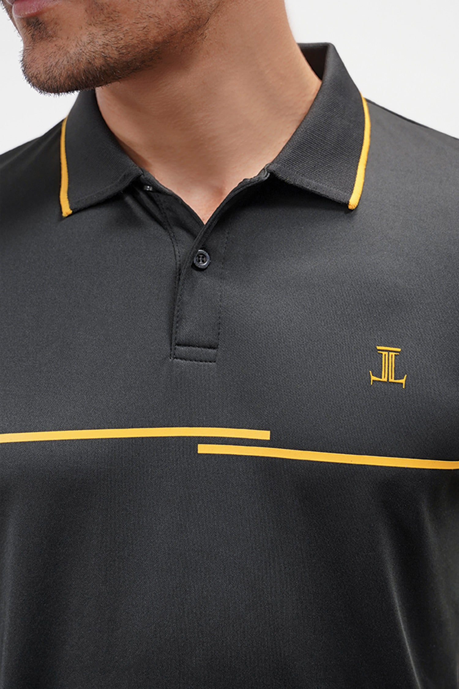Mens athletic polo shirt in black with yellow screen print and contrast collar and sleeves by JULKE