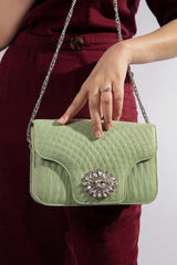 Womens leather shoulder bag in light green colour with diamante buckle, silver chain and quilting by JULKE