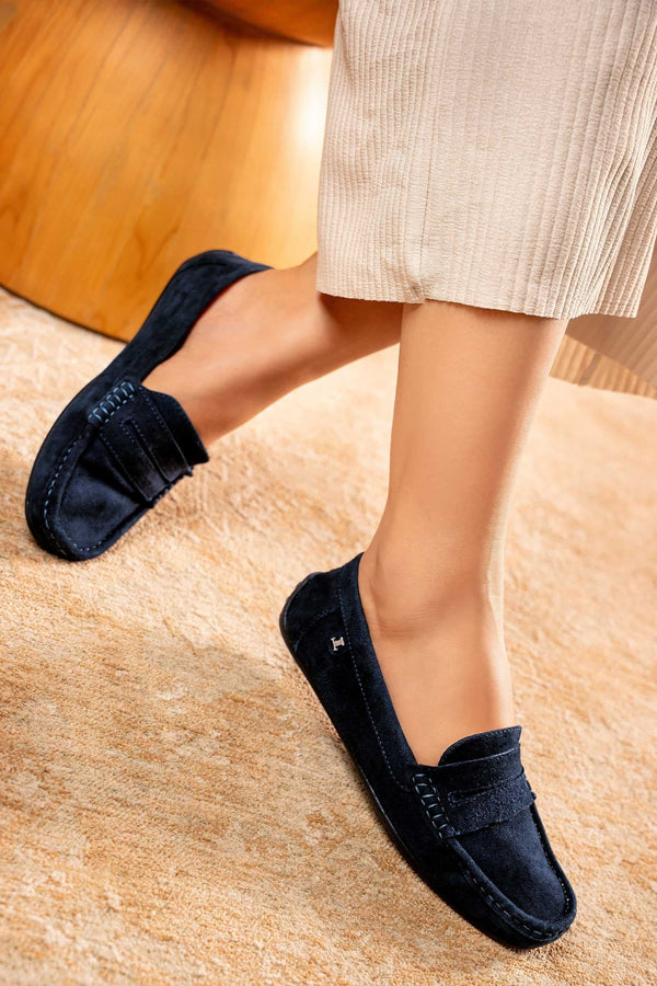 Women's winter suede leather moccasins in dark blue colour with metal logo trim and moc toe by JULKE 
