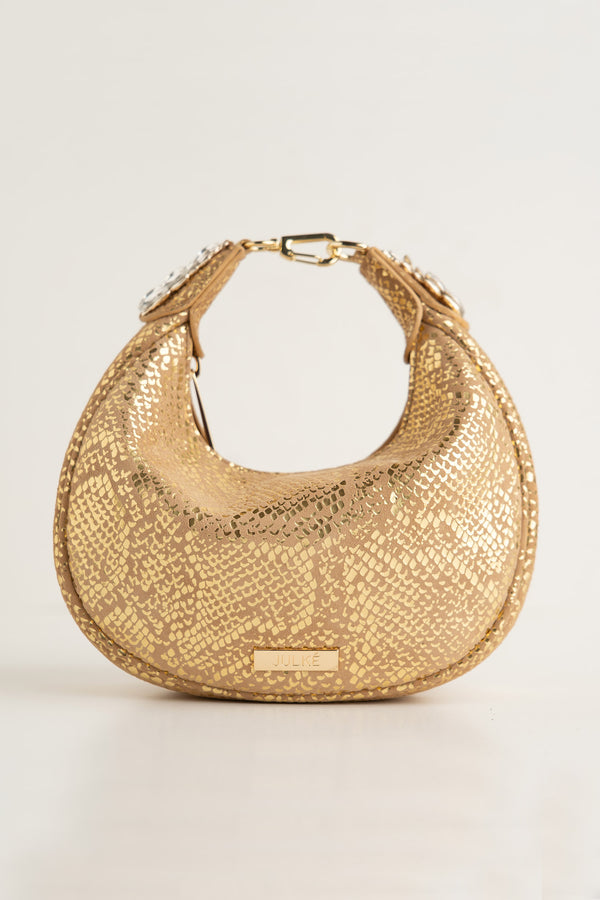 Women's leather mini halfmoon bag in gold colour with 3d reptile texture and unique clip-on handle by JULKE 