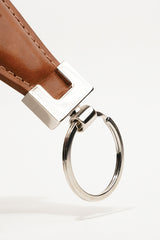 Leather key chain in tan colour in geometric shape and metal ring by JULKE