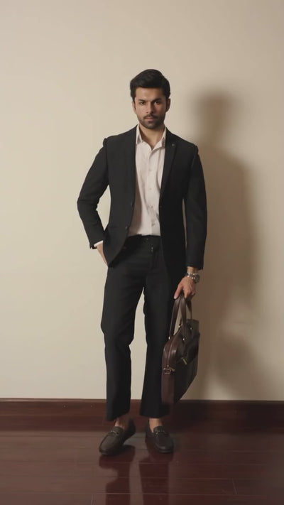 Mens full grain leather laptop bag in dark brown colour with etxra compartments and metallic gold hardware by JULKE. 