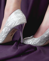 Women heels in silver colour with diamante brooch by JULKE