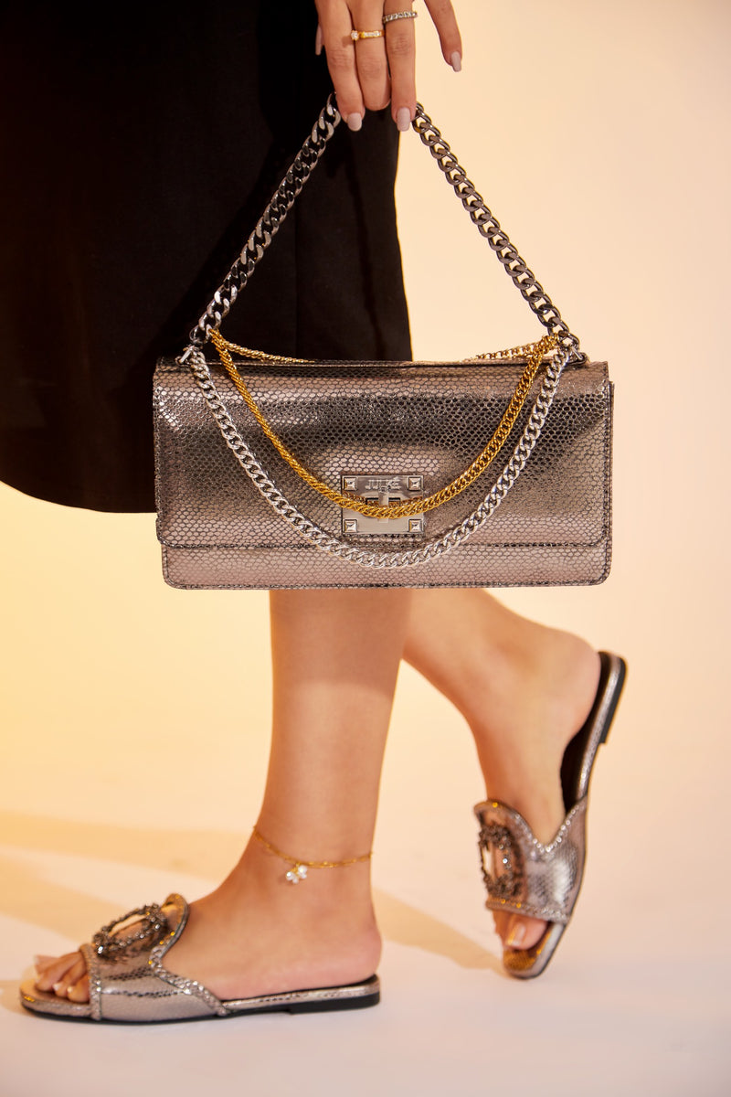 Womens leather shoulder clutch bag in gun metal colour with muti chains by JULKE
