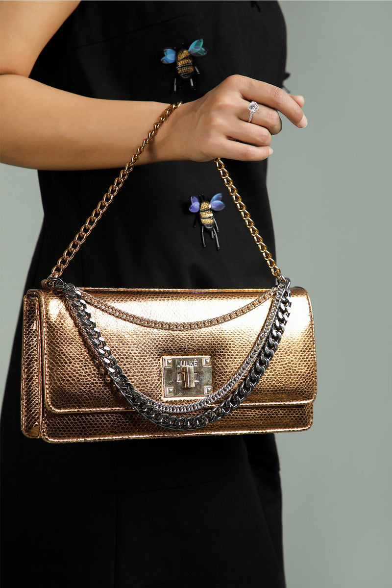Womens leather shoulder clutch bag in bronze colour with muti chains by JULKE