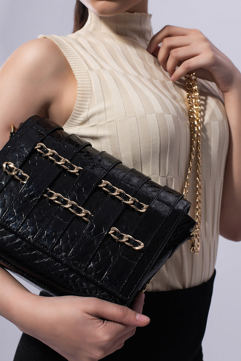 Womens original patent leather shoulder bag with chains in black colour by JULKE