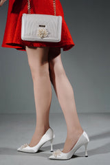 Women heels in white colour in satin with pearl brooch by JULKE