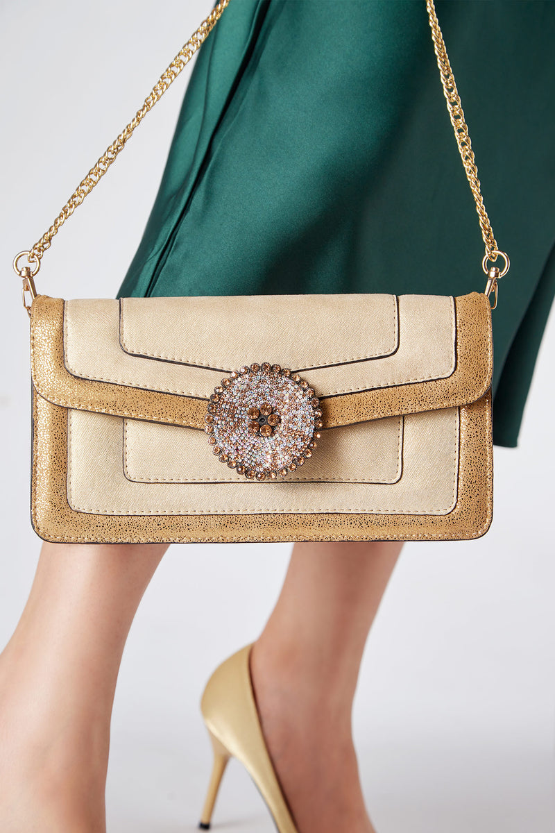 Womens shoulder clutch bag in light gold leather with diamante flower by JULKE