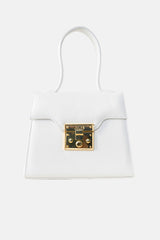 Womens statement leather hand bag in white colour with gold lock by JULKE