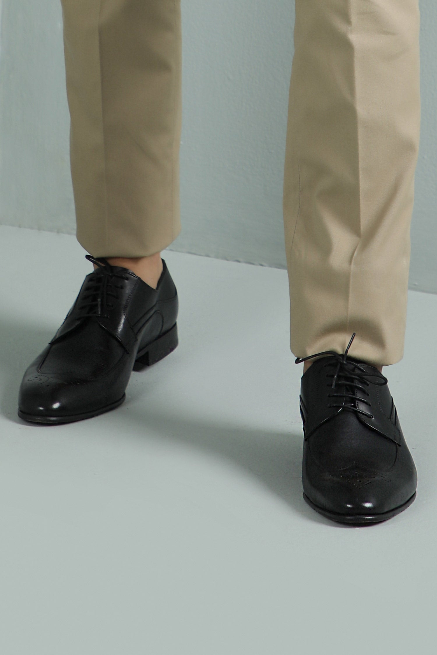 Mens leather shoes in black colour with laces and brogue toe by JULKE.  