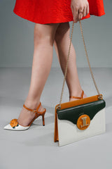Women heels in mustard & white colour with floral brooch & matching bag by JULKE