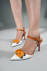 Women heels in mustard & white colour with floral brooch by JULKE