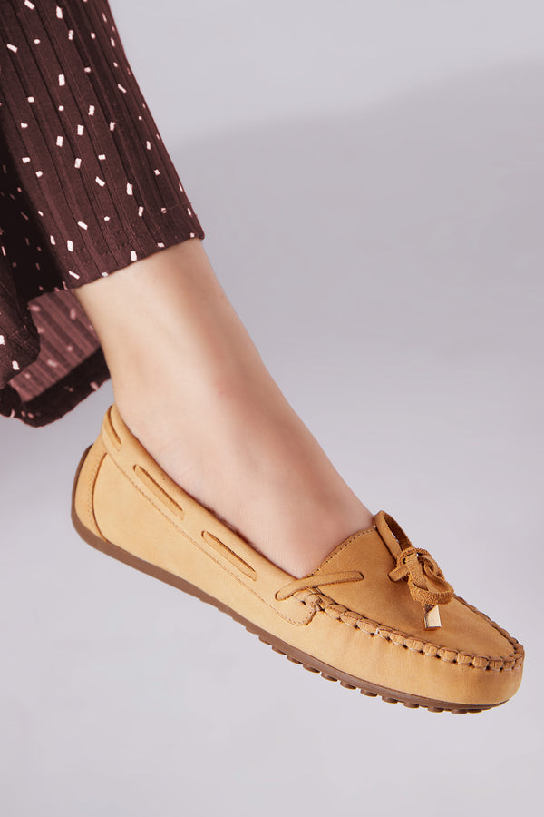 Womens winter moccasins in light brown leather with bow by JULKE