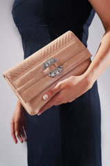 Womens leather clutch bag in light pink colour with diamante buckle by JULKE 