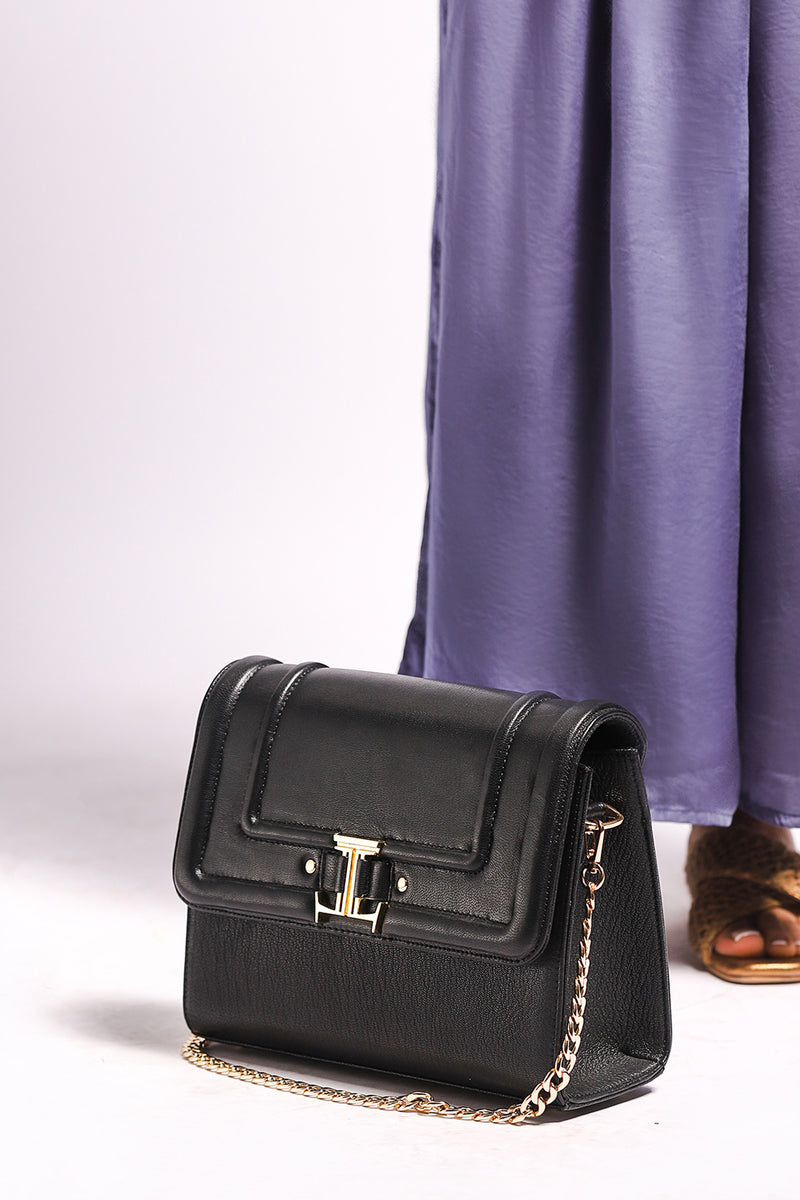 Womens leather shoulder bag with gold chain strap in black colour by JULKE
