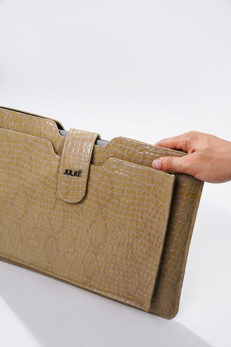 Leather laptop sleeve in beige colour with crocodile texture by JULKE