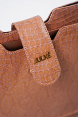 Leather laptop sleeve in light pink colour with crocodile texture by JULKE