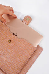 Leather laptop sleeve in light pink colour with crocodile texture by JULKE
