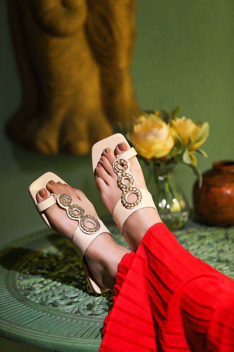 Women leather summer flats in beige colour with toe strap & gold chain in beige colour by JULKE