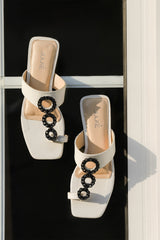 Women leather summer flats in beige colour with toe strap & black chain in white colour by JULKE