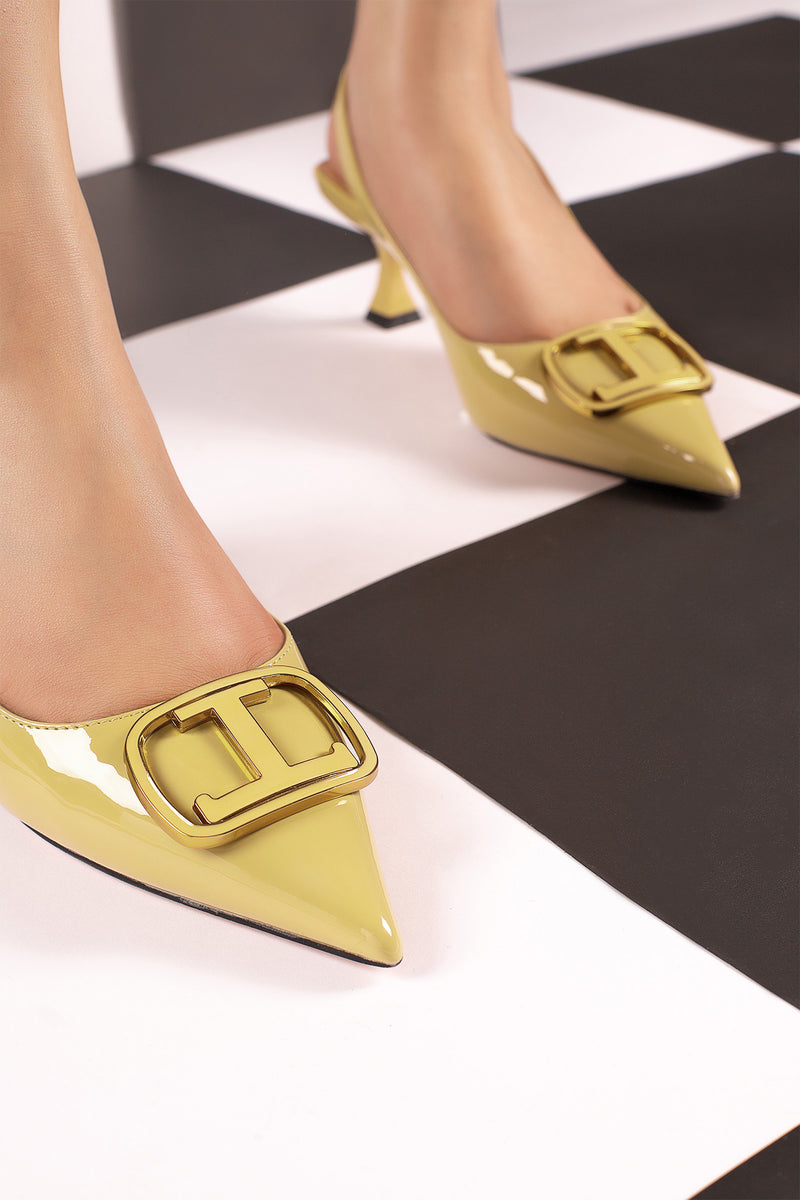 Women slingback heels in light yellow colour with logo buckle by JULKE