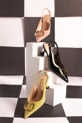 Women slingback heels in yellow, pink & black colours with logo buckle by JULKE