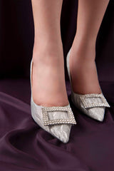 Women heels in silver colour with diamante brooch by JULKE